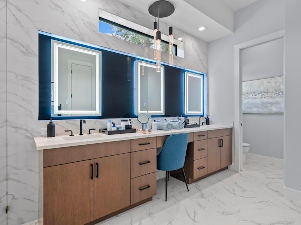 Master Bath | Sapphire Model | Seaglass Master bath with blue accents, flat cabinets and matte large tile floor