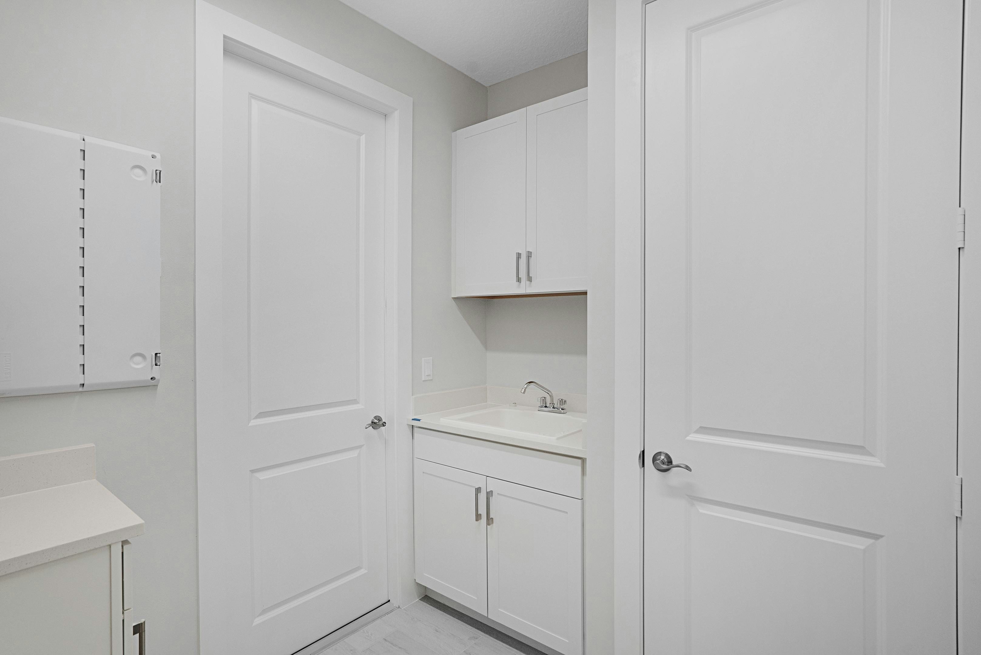 Laundry Room | 2148 Falls Manor