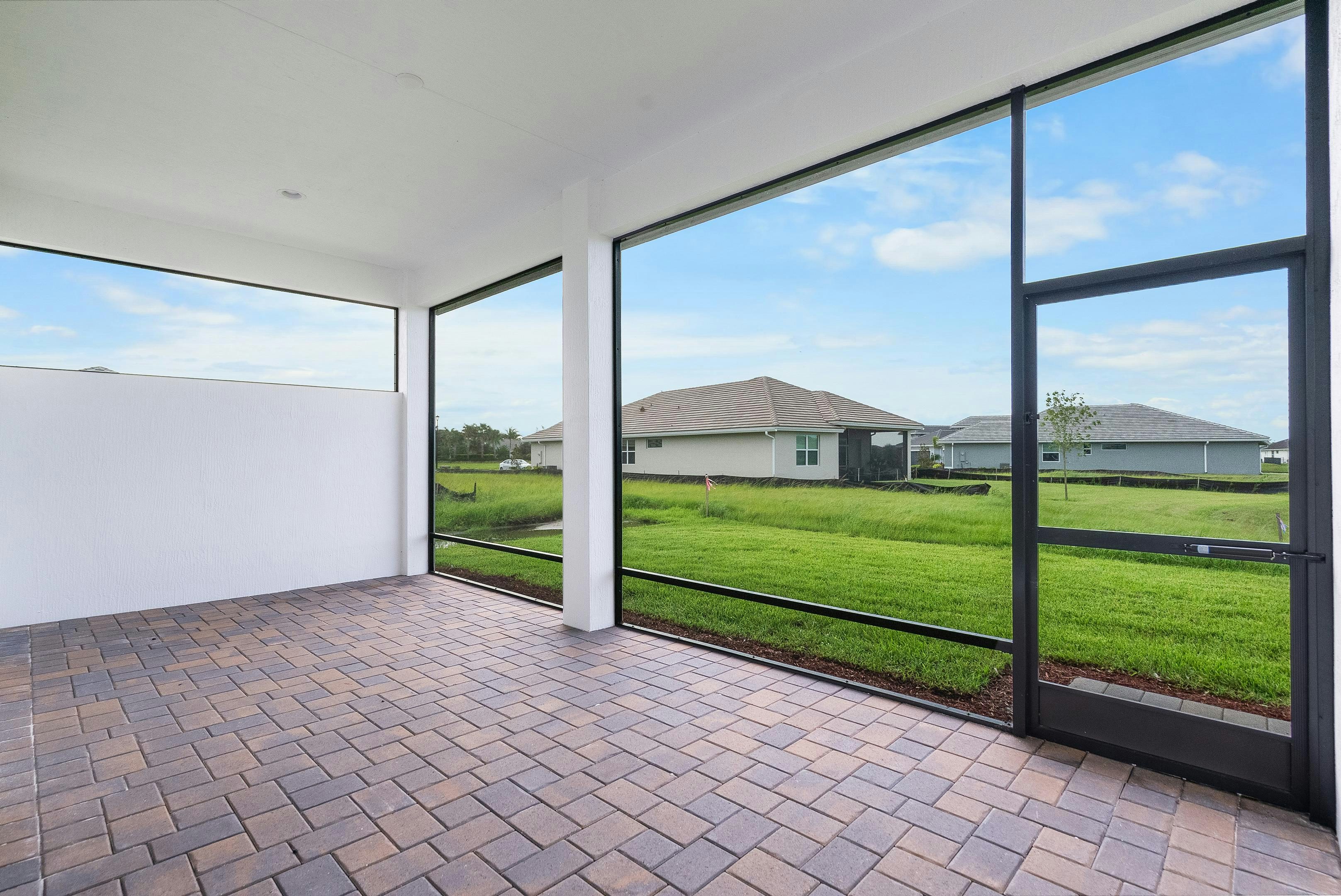 Lanai to yard | 12398 SW Sunrise Lake Terrace