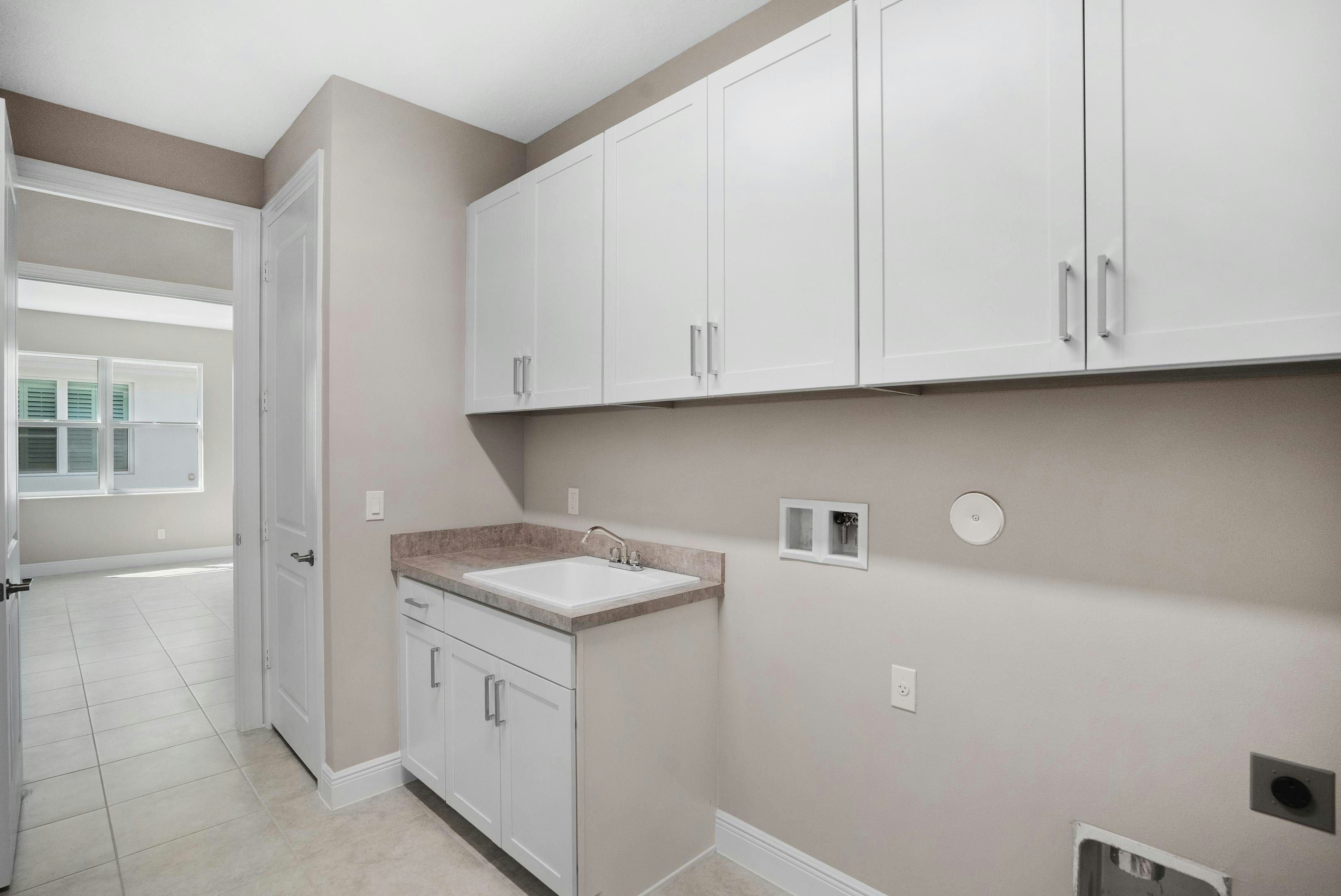 Laundry Room | 12446 SW Sunrise Lake Terrace