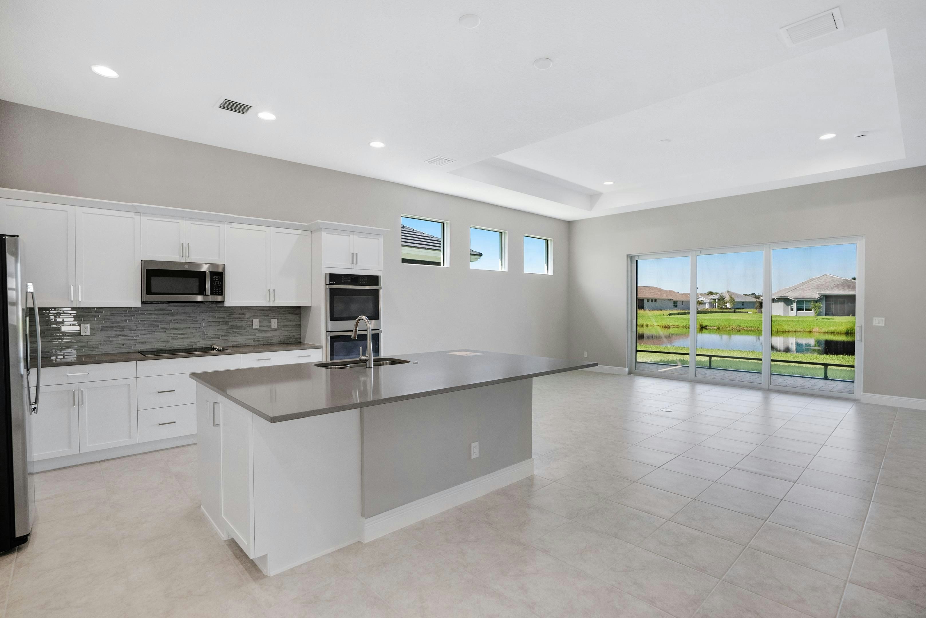 Kitchen to Great Room | 12446 SW Sunrise Lake Terrace