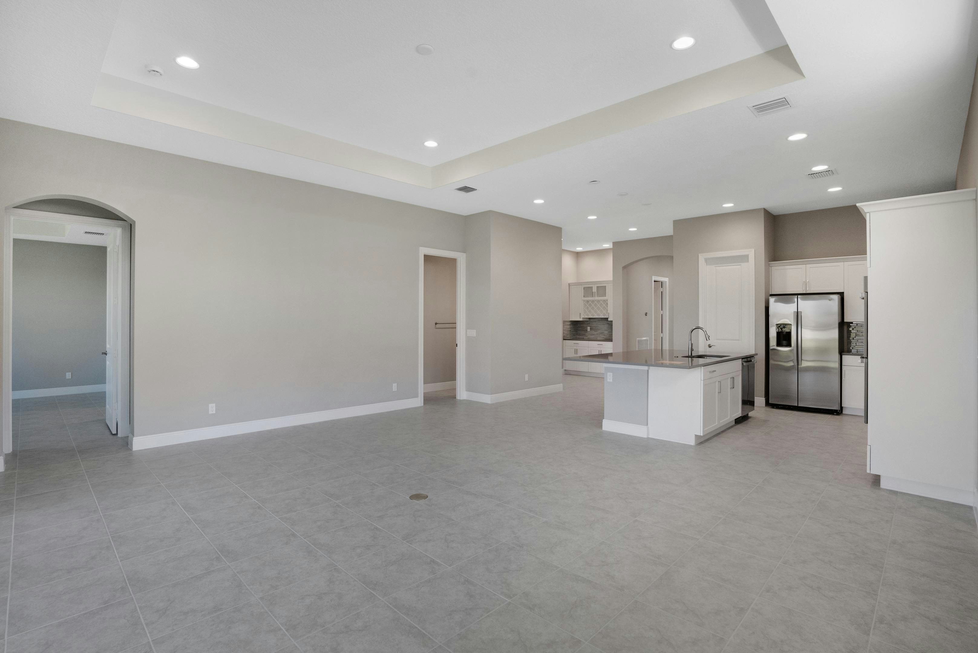 Great Room to Kitchen | 12446 SW Sunrise Lake Terrace
