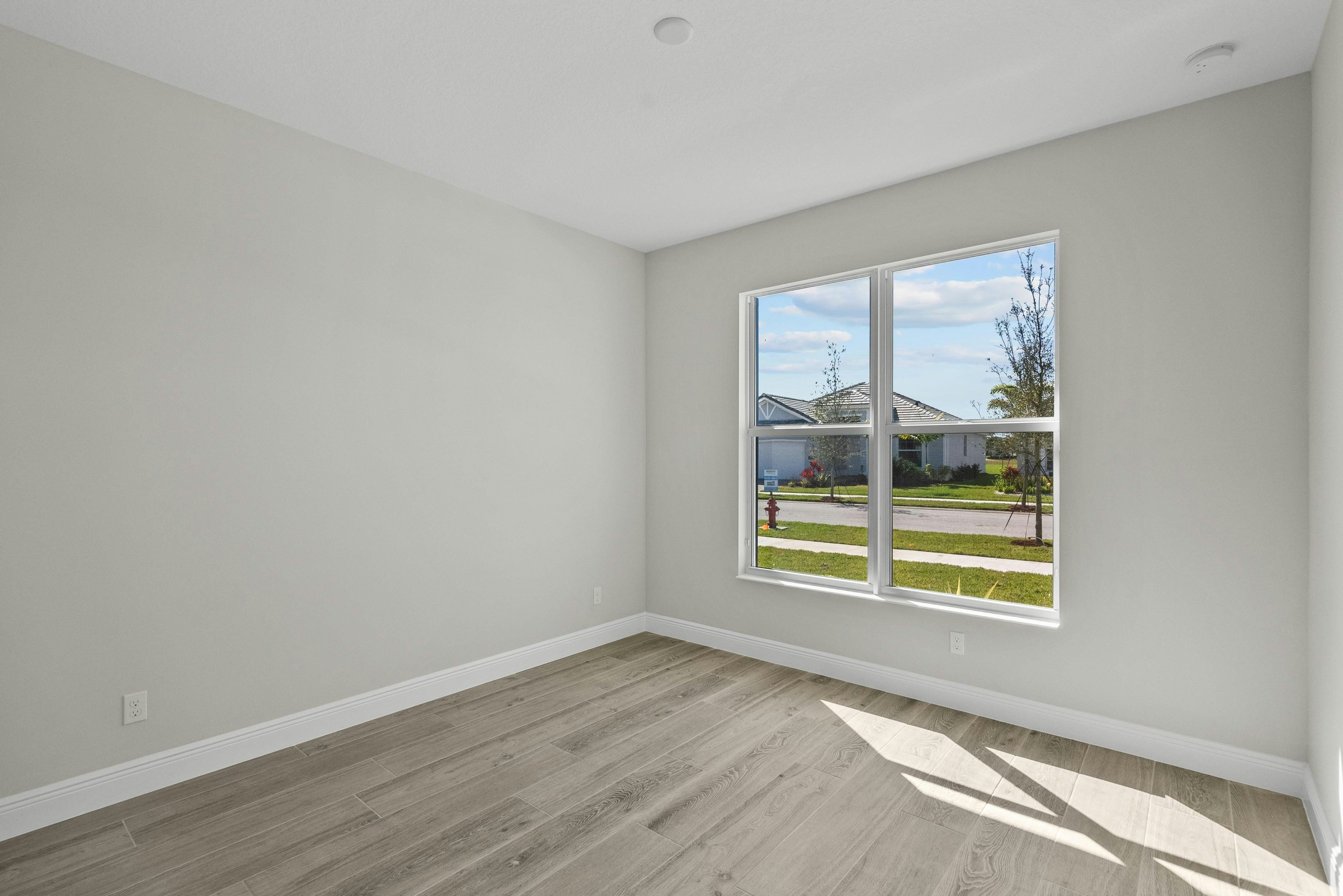 Secondary Bedroom | 12501 SW Sunrise Lake Terrace