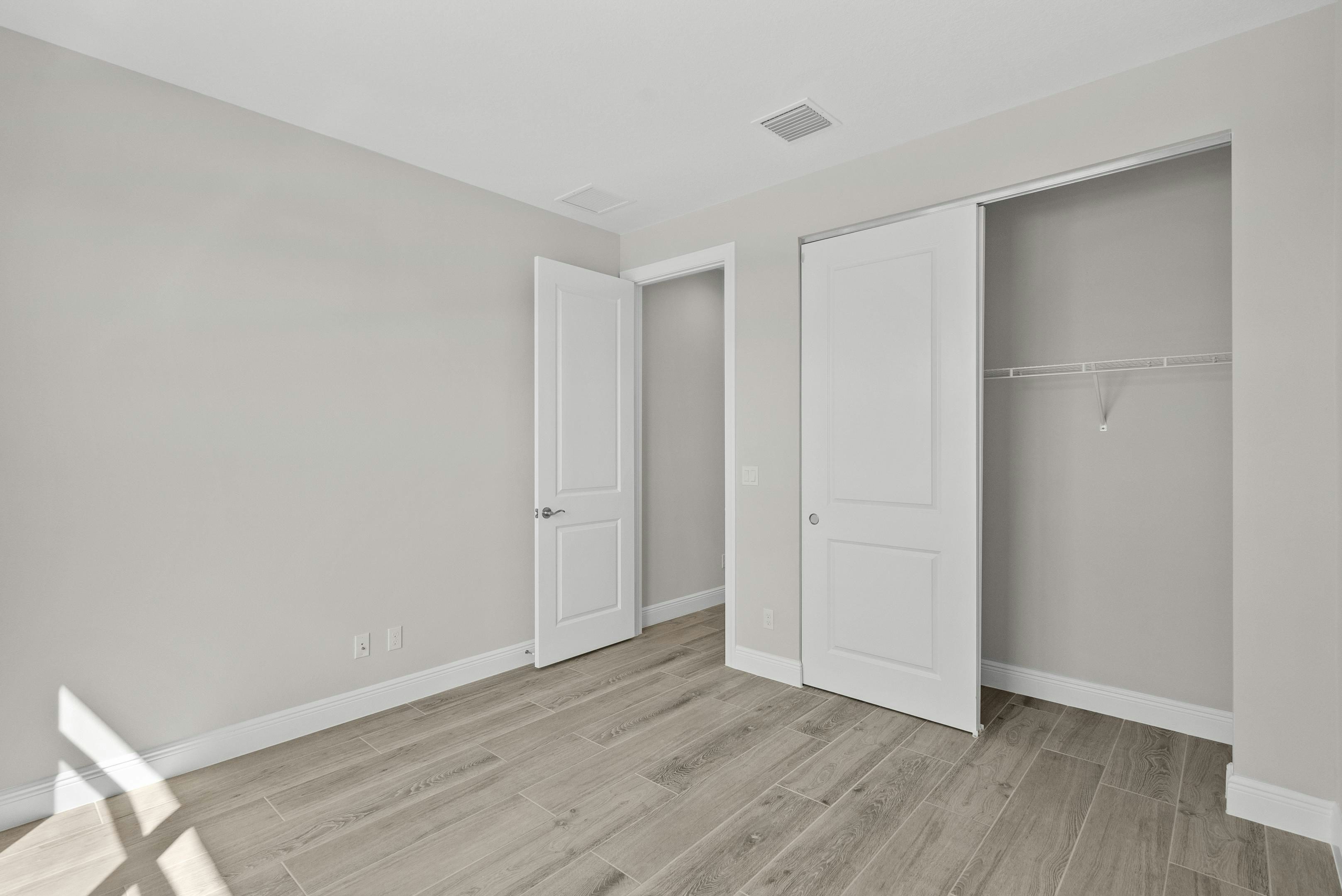 Secondary Bedroom | 12501 SW Sunrise Lake Terrace