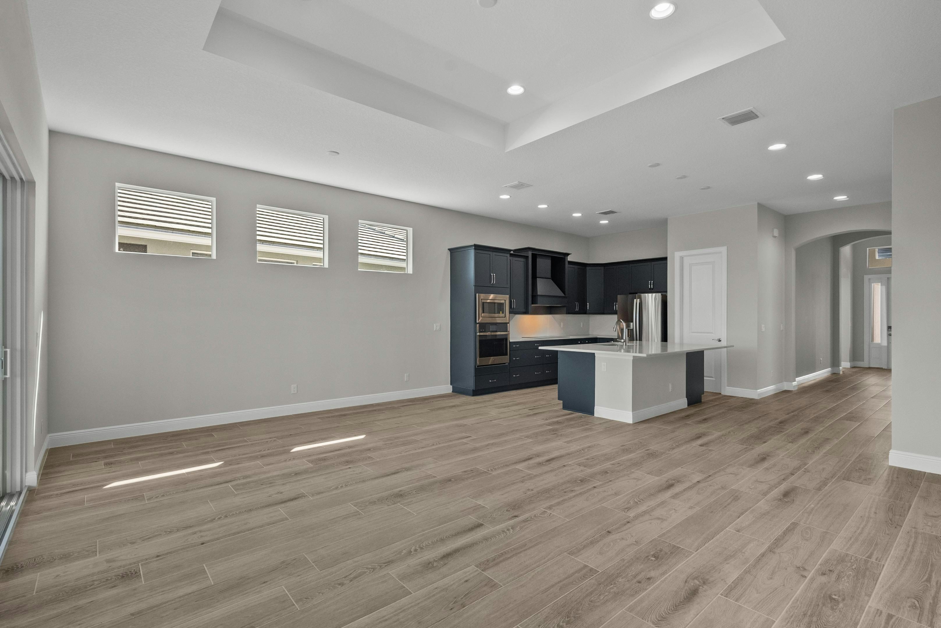 Great Room to Kitchen | 12501 SW Sunrise Lake Terrace