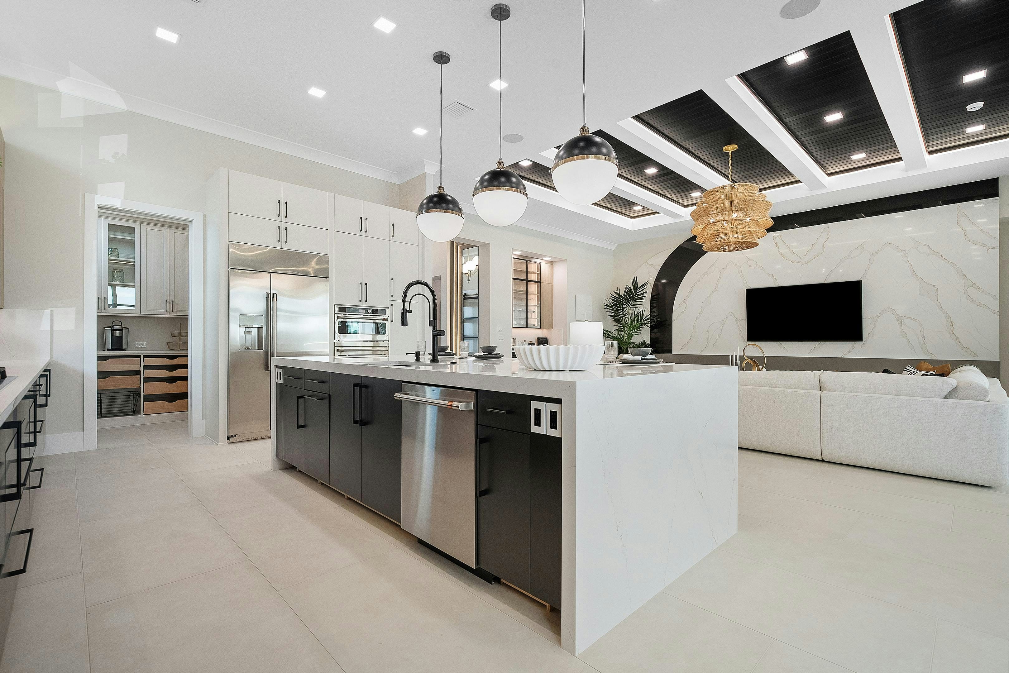 Black and white kitchen with stainless-steel appliance