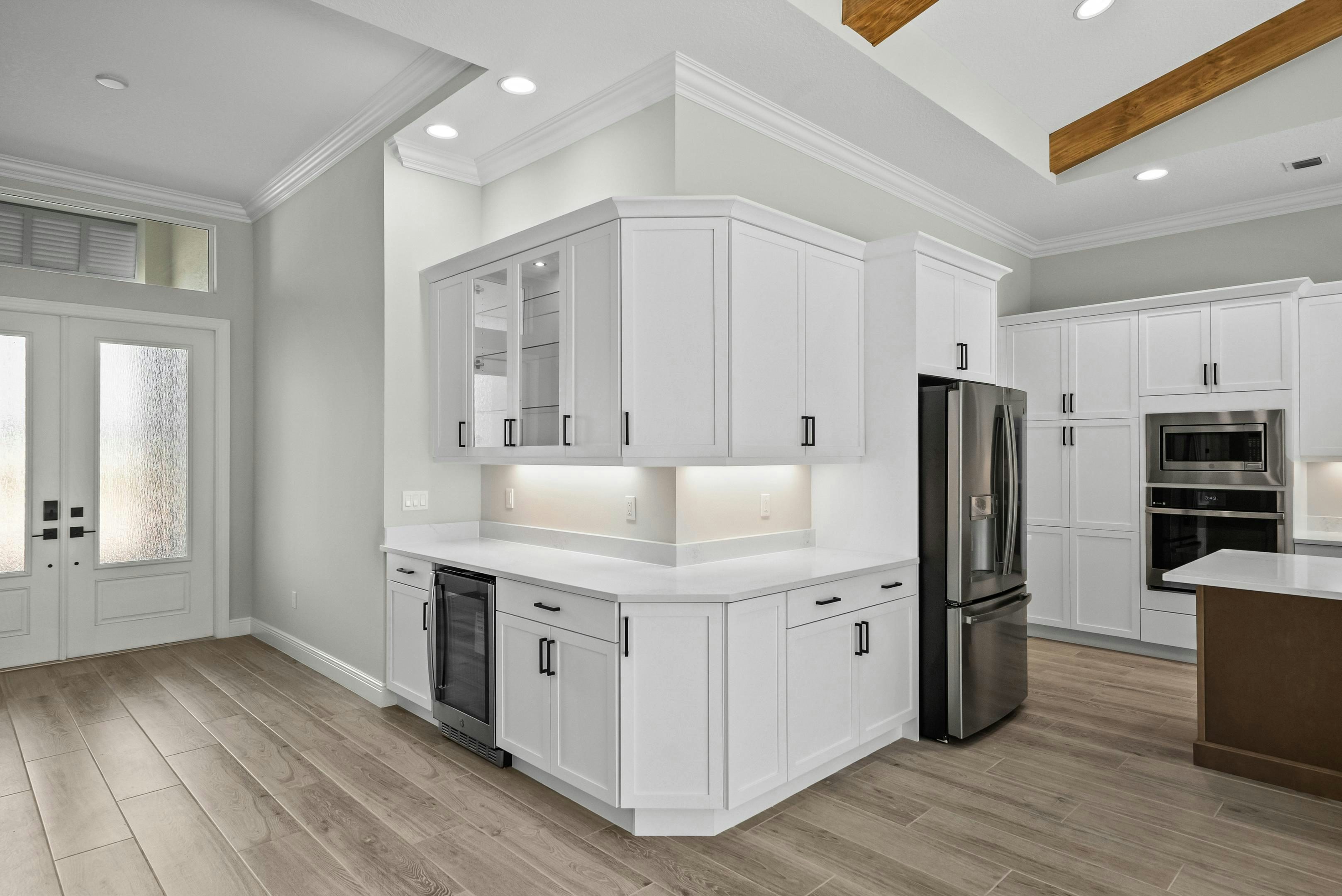 Dry Bar, Foyer and Kitchen - Weston - 6383 High Pointe Cir