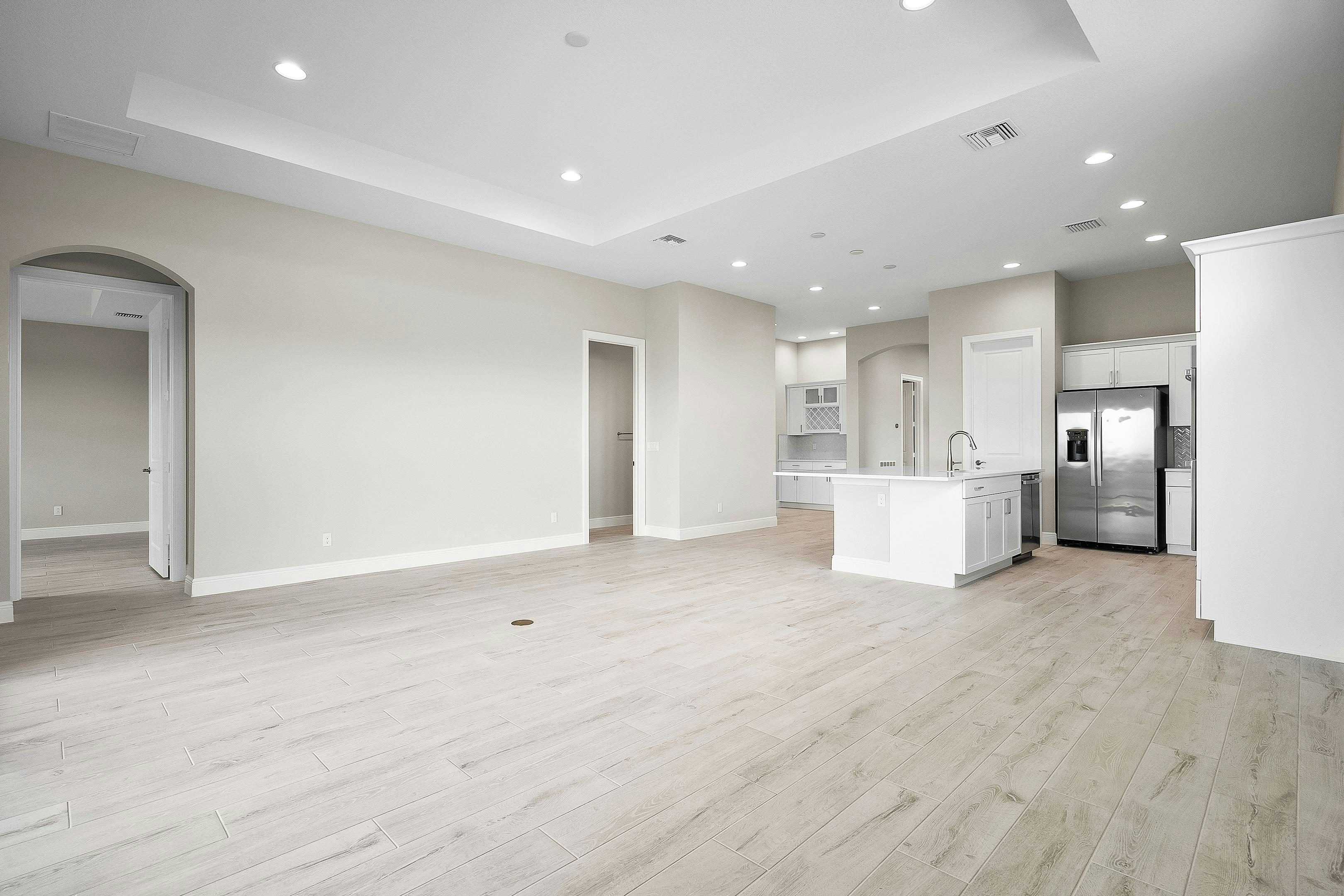 Great Room to Kitchen | 12471 SW Sunrise Lake Terrace