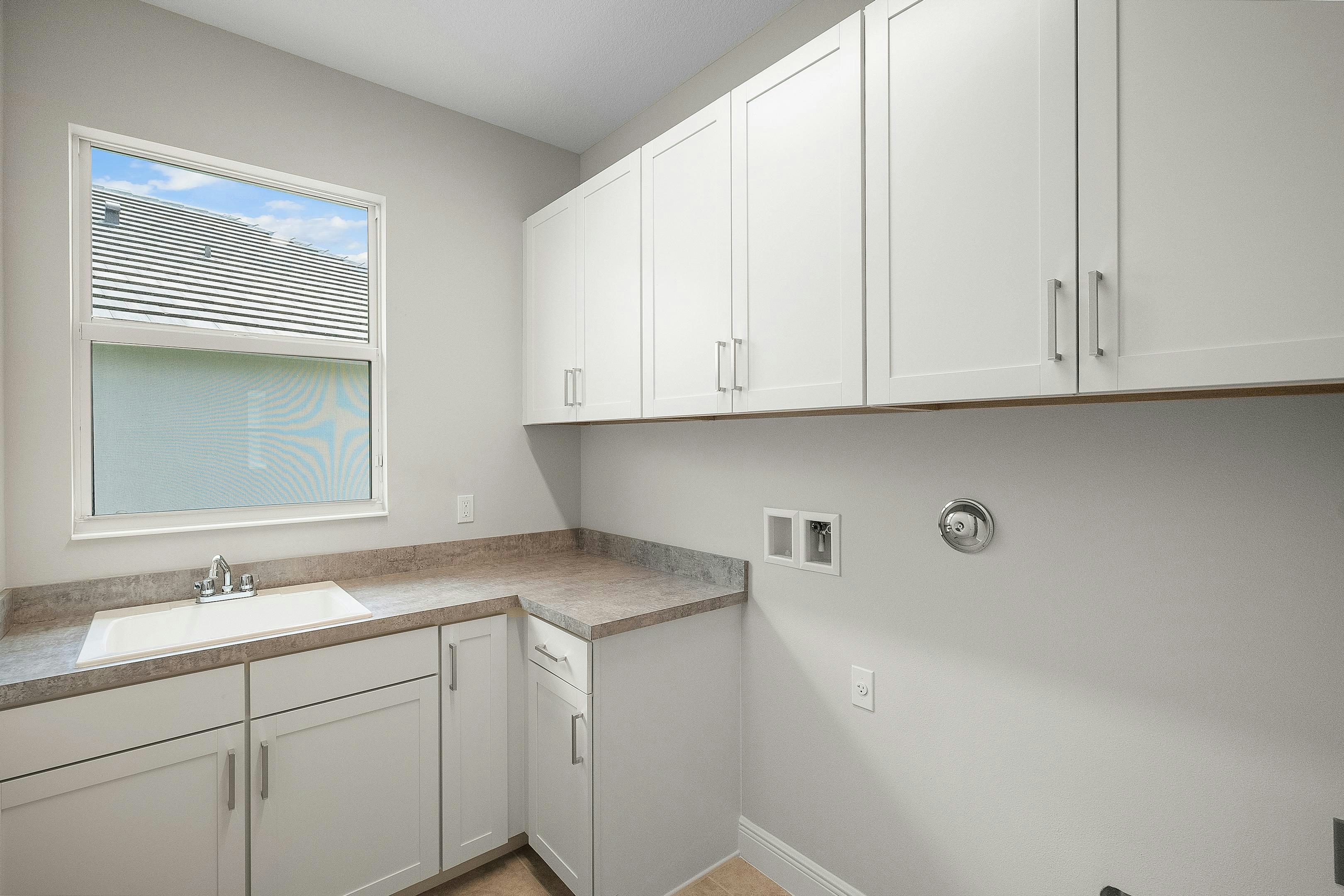Laundry Room | 12507 SW Sunrise Lake Terrace