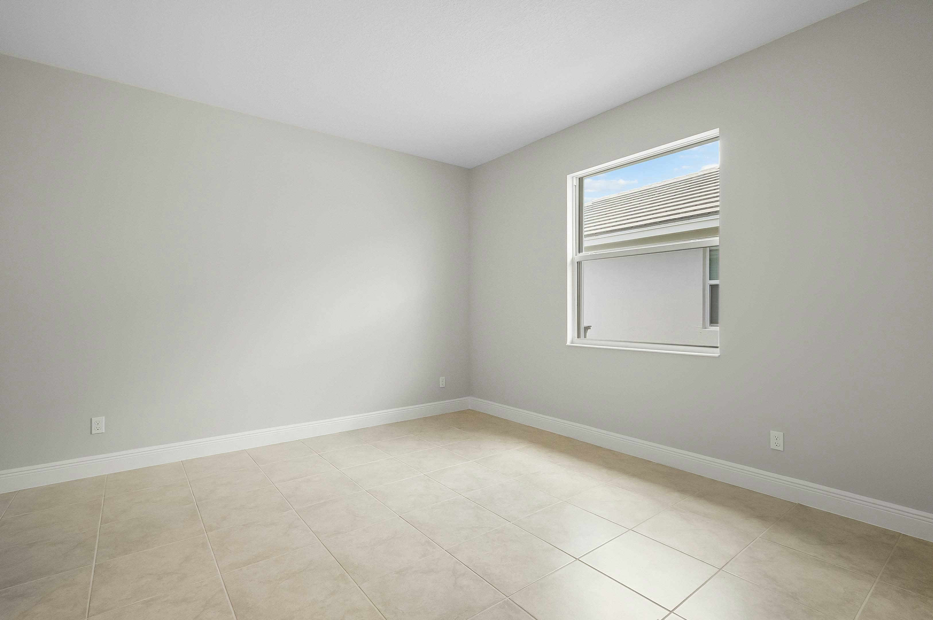 Secondary Bedroom | 12507 SW Sunrise Lake Terrace