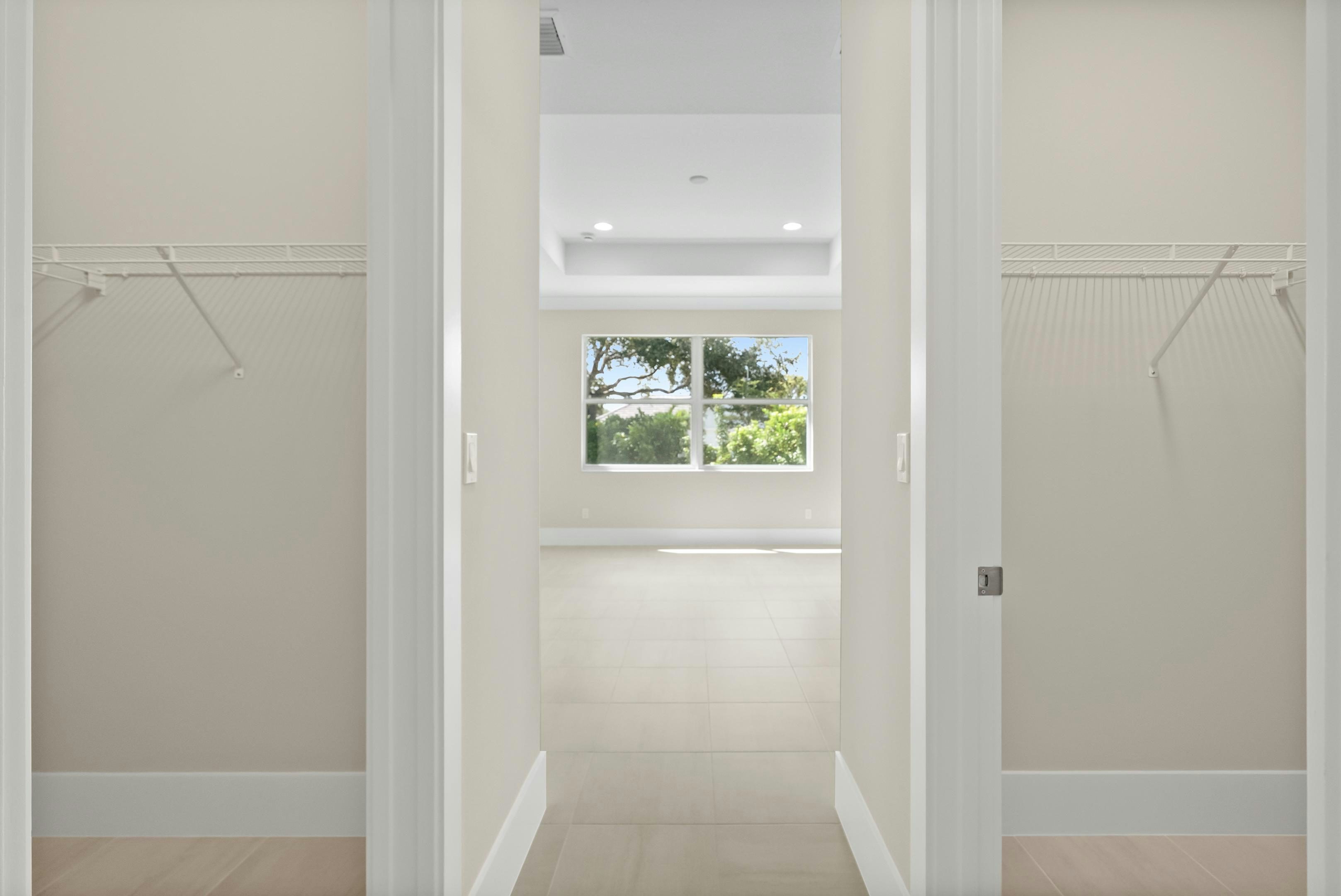 Master Walk-in Closet | 2147 Falls Manor