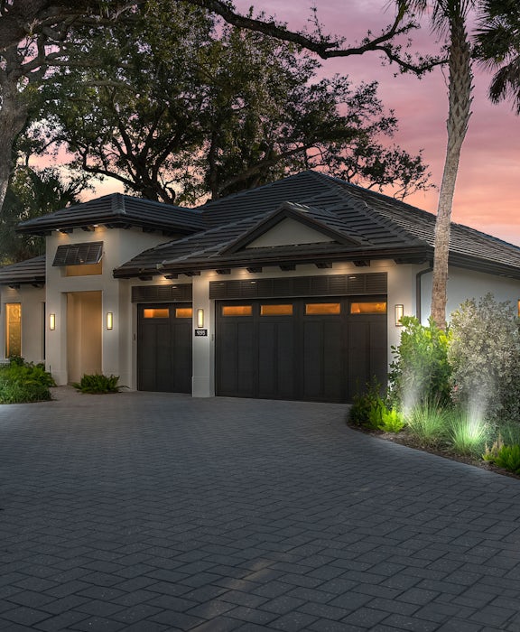 Front Elevation with uplighting | 9193 Seaglass Ct