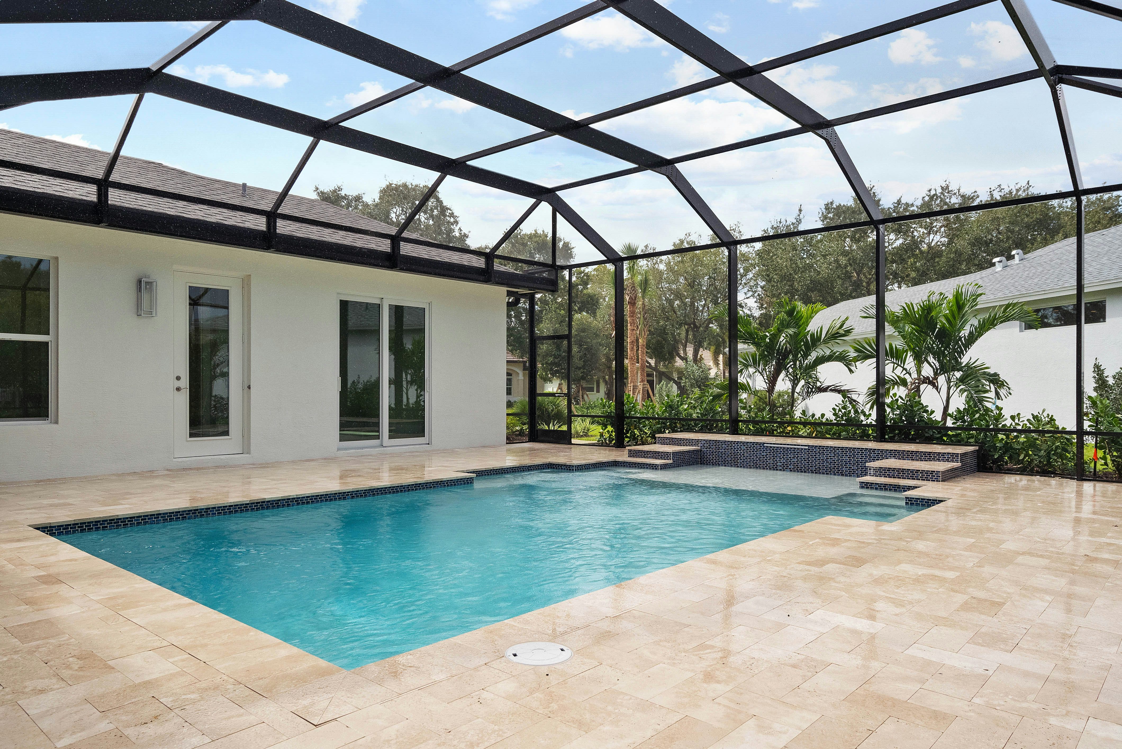 Screened Pool & Deck | 236 Oak Hammock Cr SW