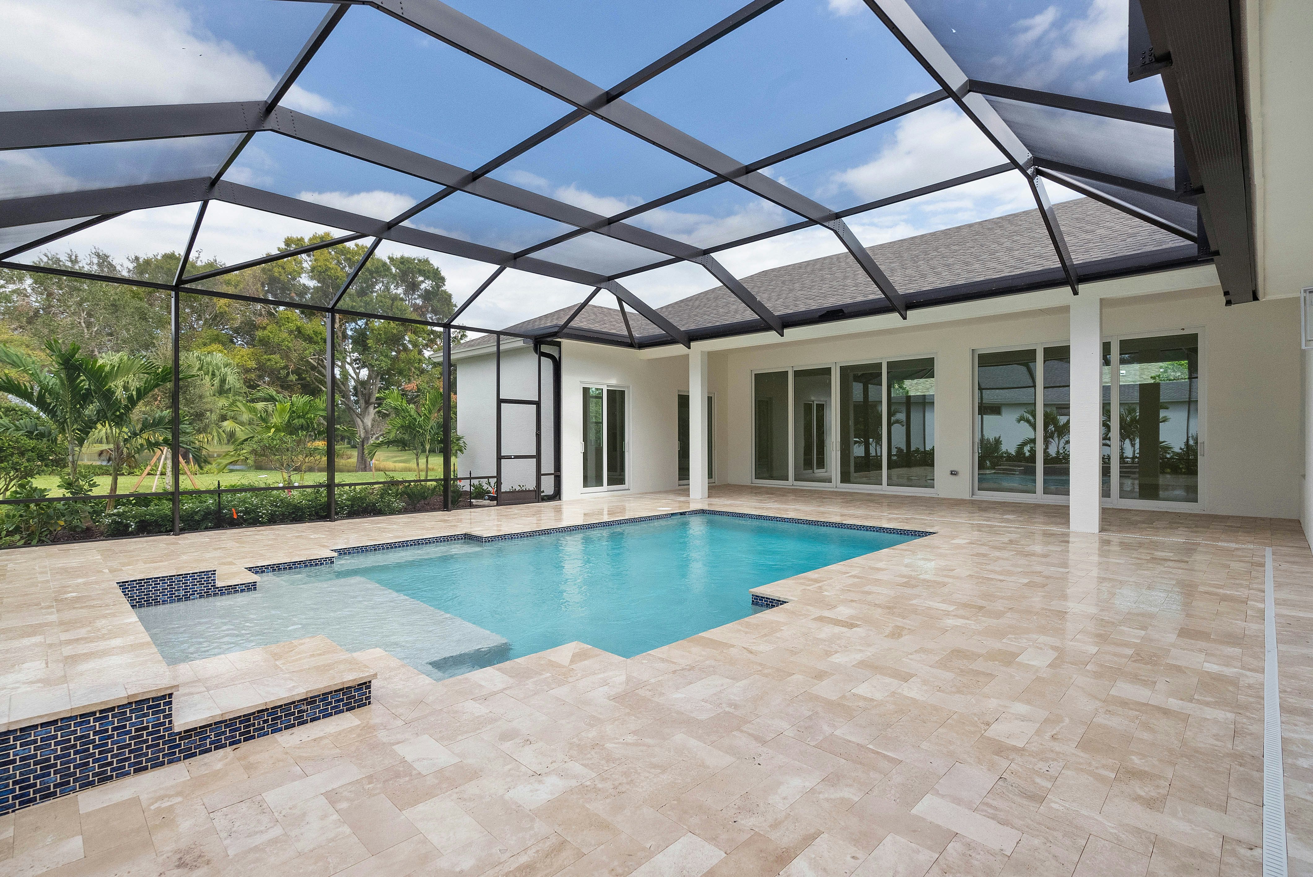 Screened Pool & Pool Deck | 236 Oak Hammock Cr SW