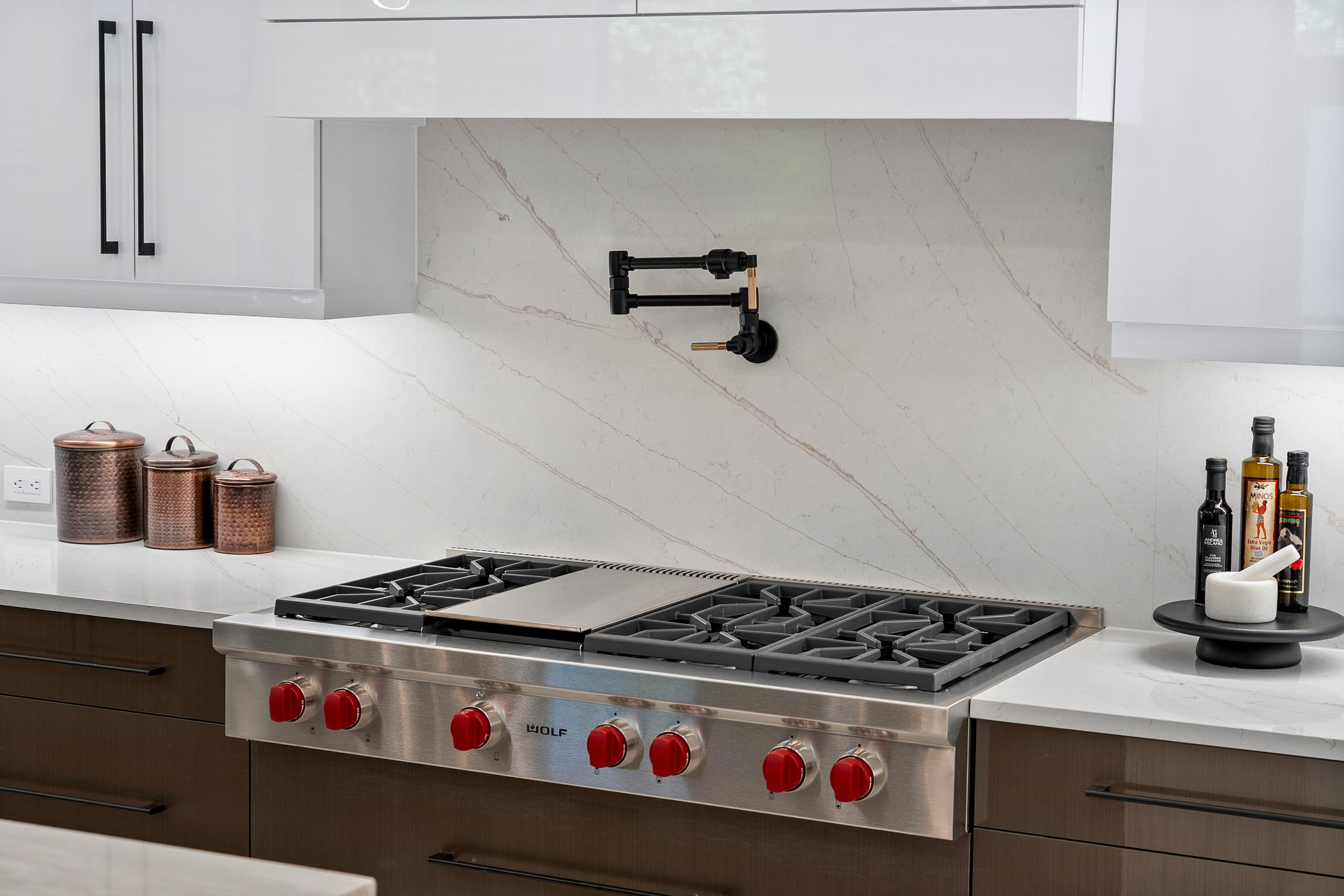 Wolf 6 Burner w/Flattop, Black & Gold Pot Filler, Large Quartz Backsplash | Design Studio