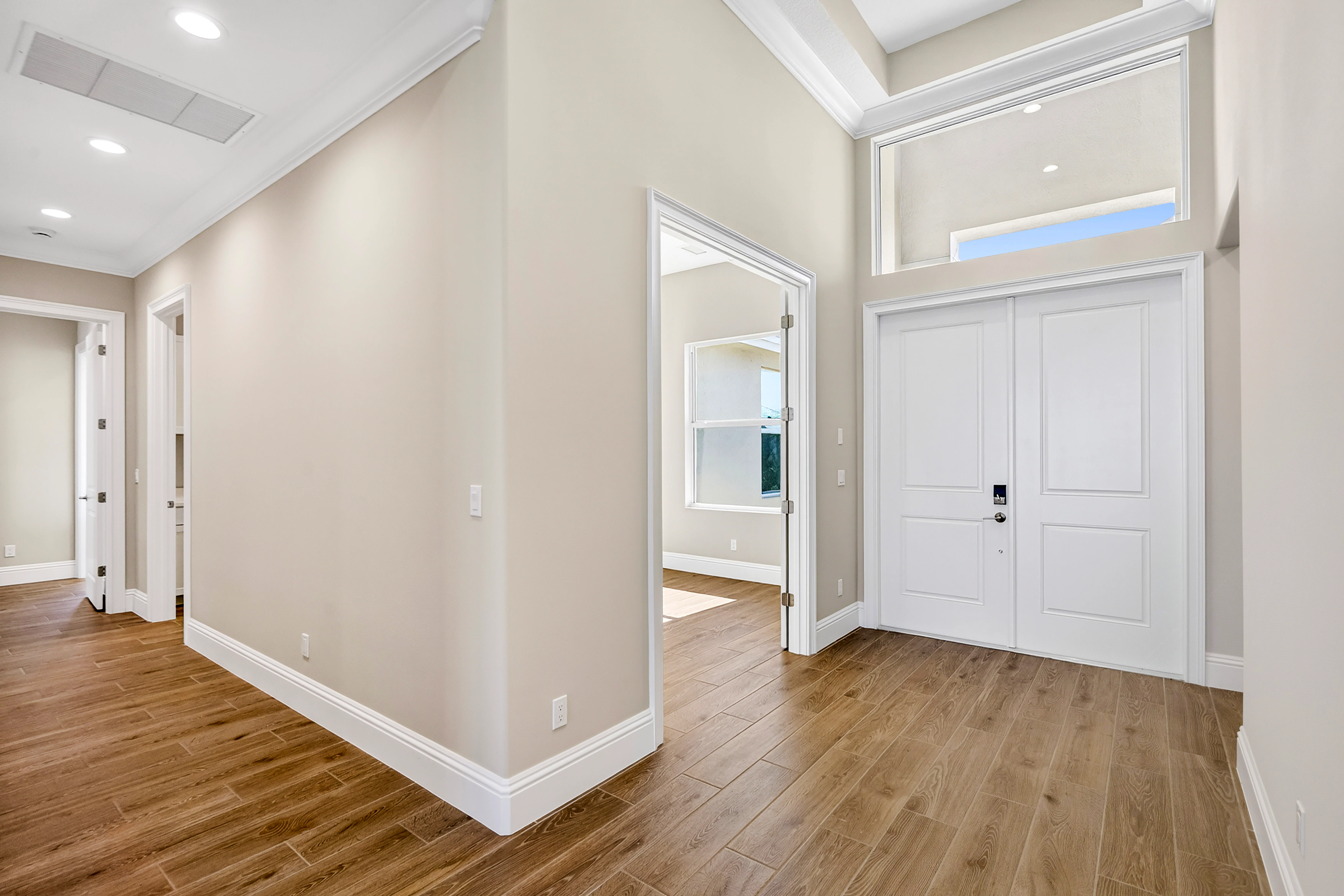 Foyer to Den | 14322 SW Belterra Drive