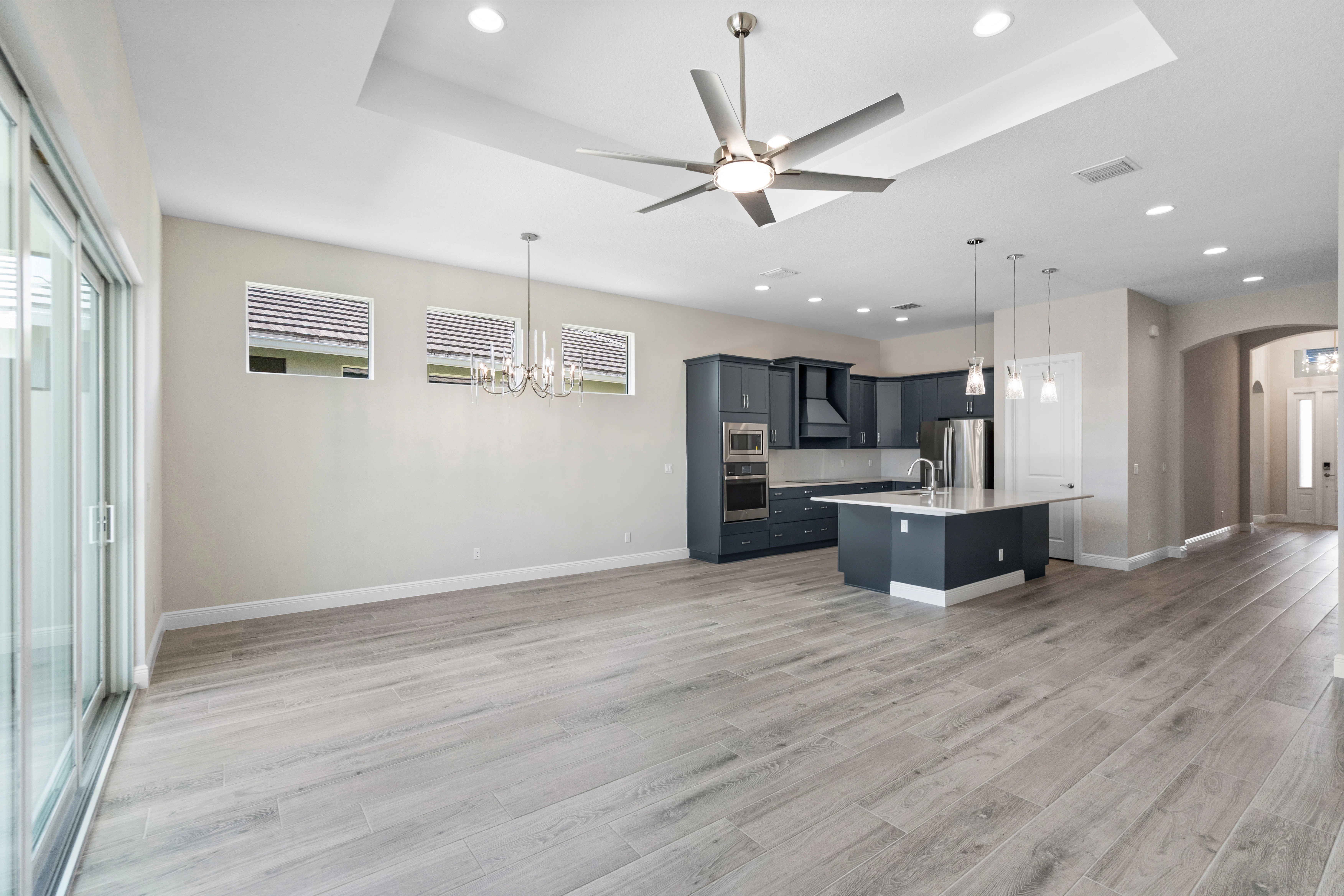 Great Room, Dining and Kitchen Lights | 12501 SW Sunrise Lake Terrace