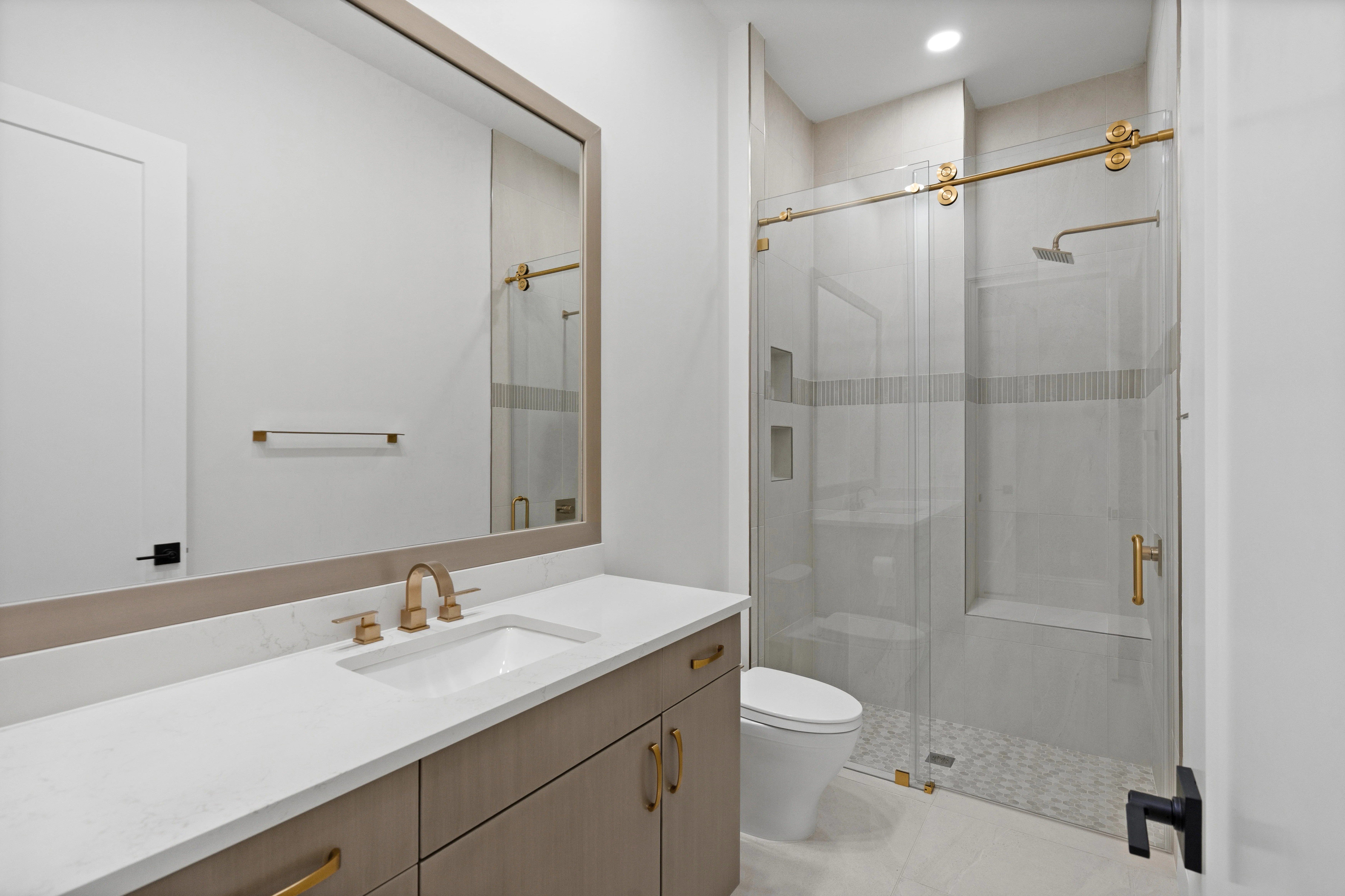 GUEST BATH WITH BY- PASS DOORS